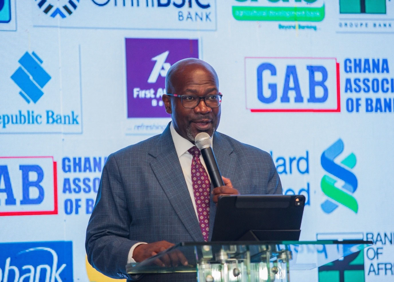 Dr. Samuel Okae, Bank of Ghana delivering his presentation
